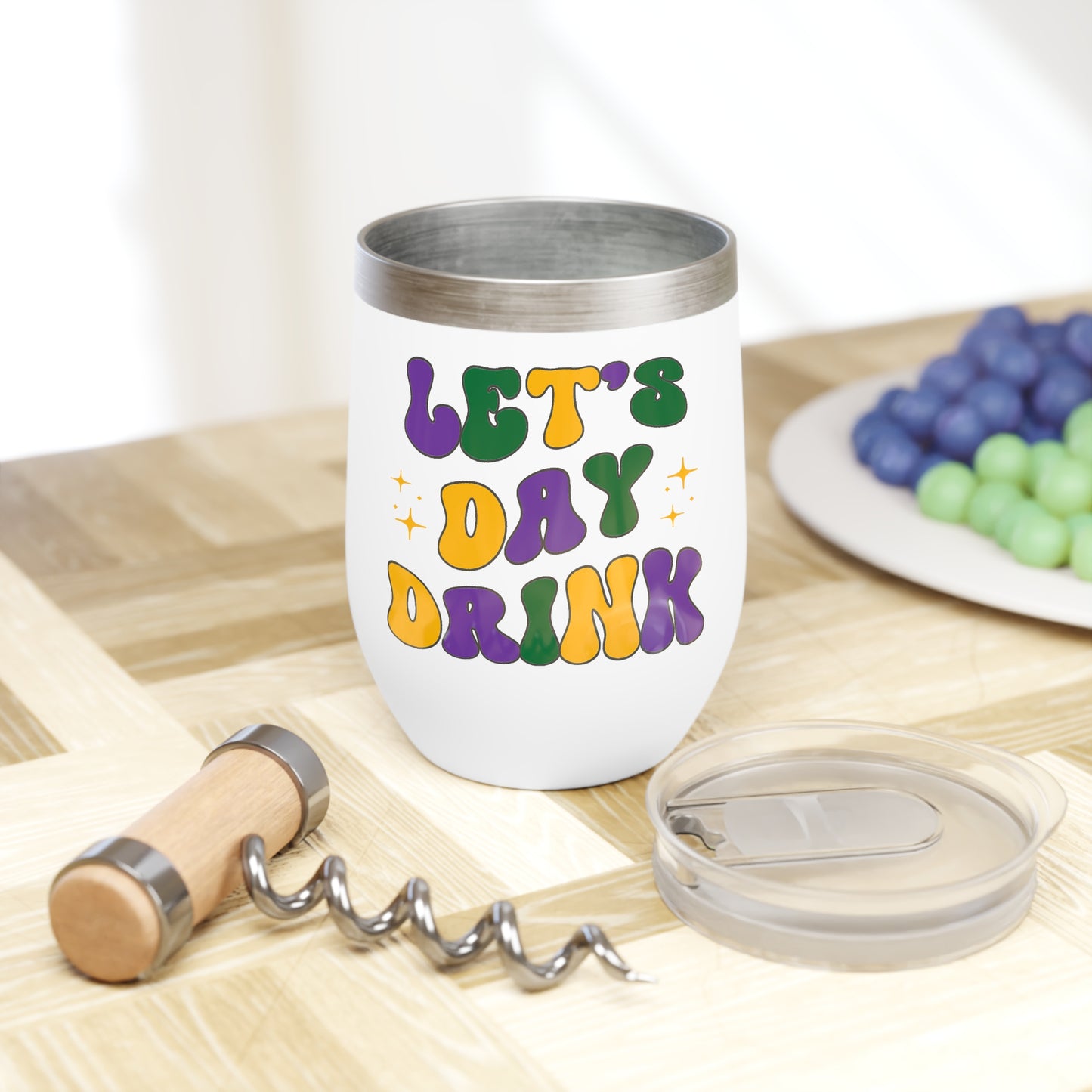 mardi gras themed wine tumbler that says "let's day drink"