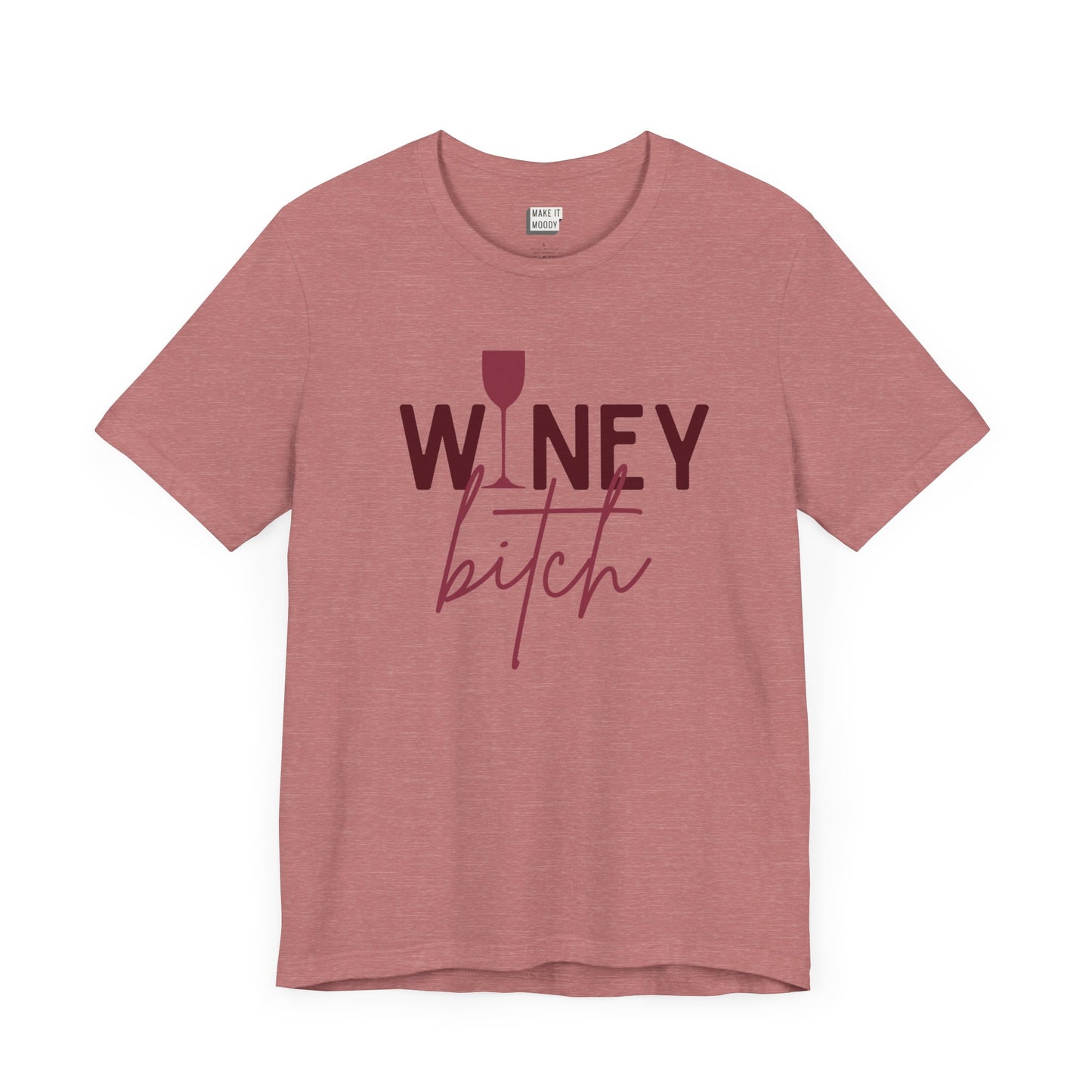 heathered mauve colored drinking t-shirt that says WINEY BITCH on the front. There is a graphic of a wine glass in place of the I in the word winey.