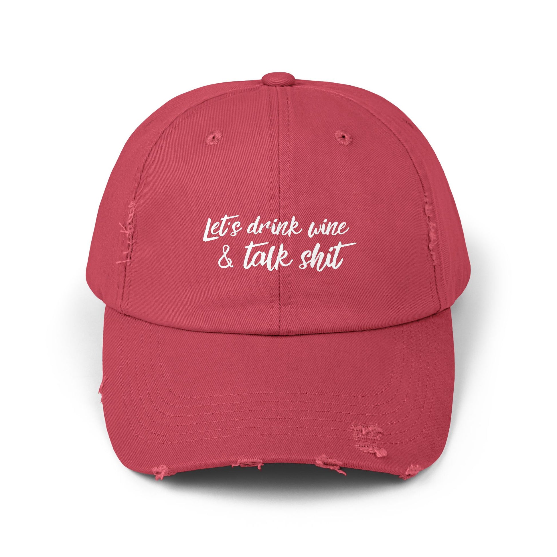 Red drinking hat that says LET'S DRINK WINE & TALK SHIT on the front in white script lettering.