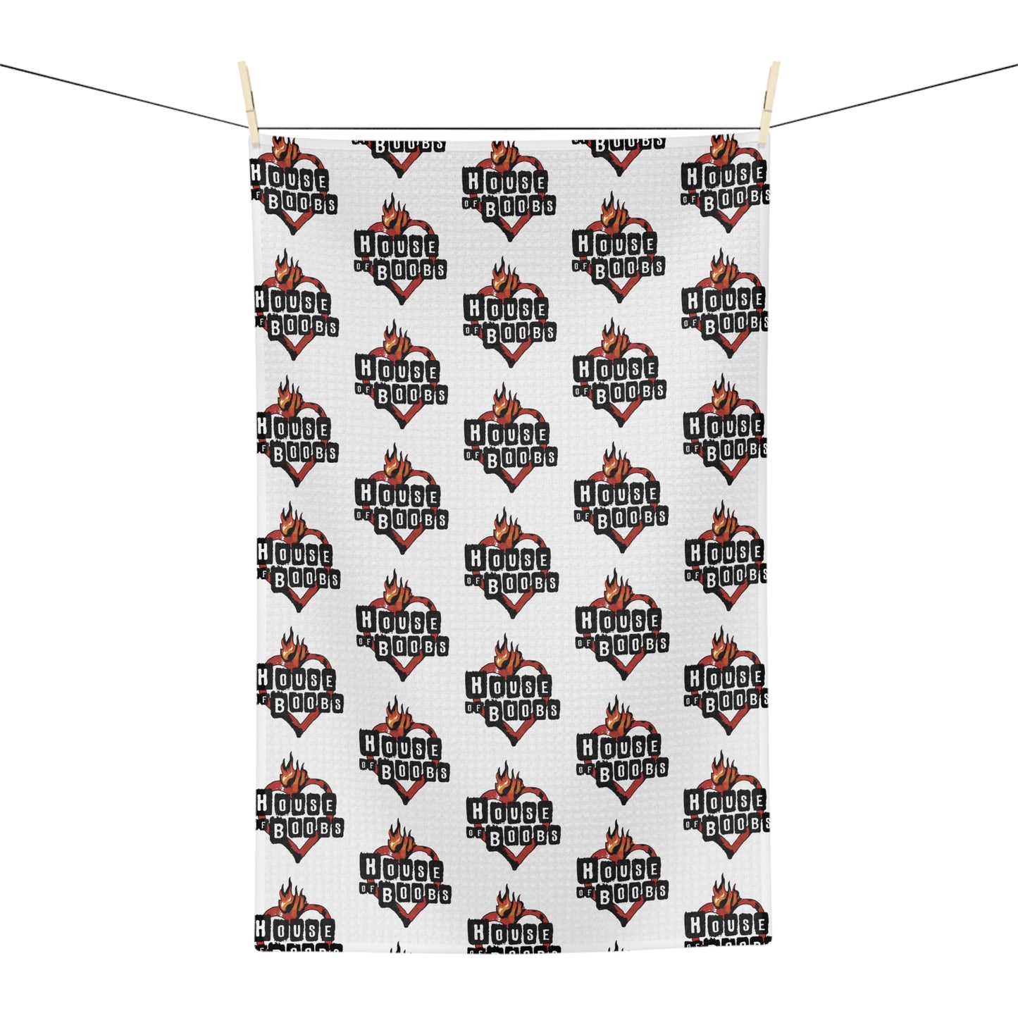 breastfeeding nursing towel with repeating pattern house of boobs print, reminiscent of house of blues logo
