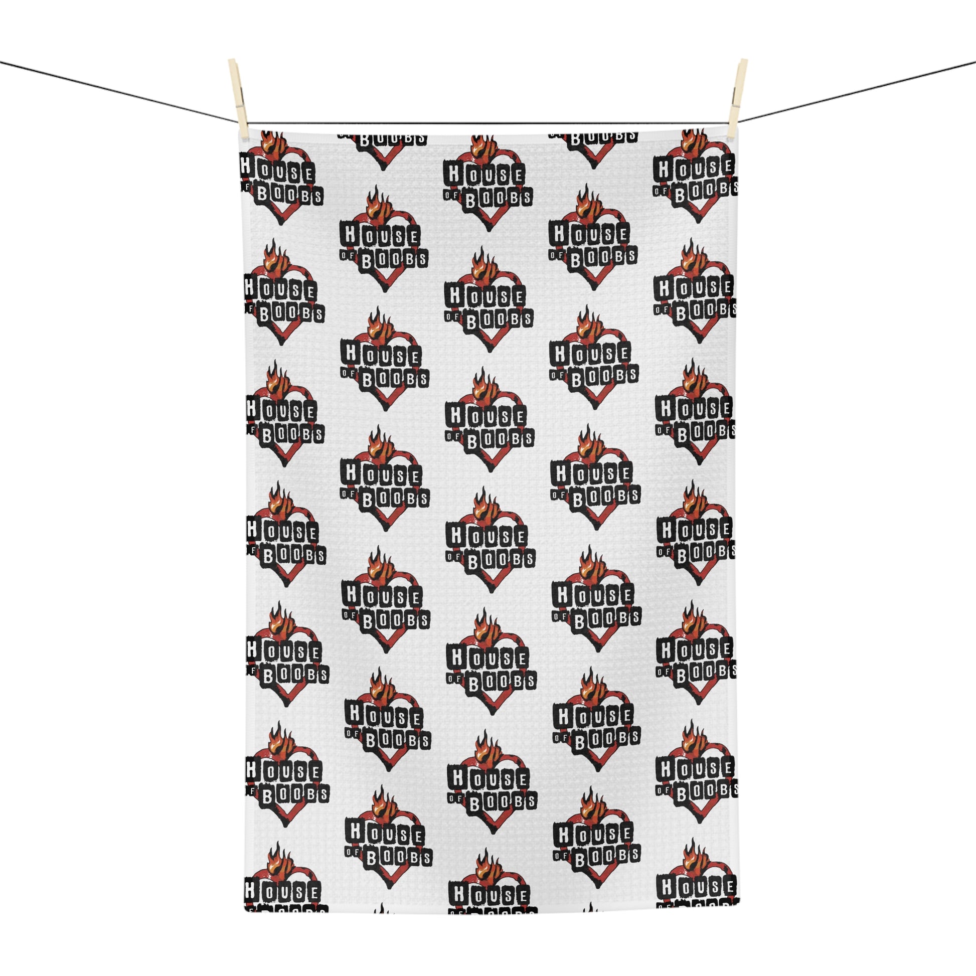 breastfeeding nursing towel with repeating pattern house of boobs print, reminiscent of house of blues logo