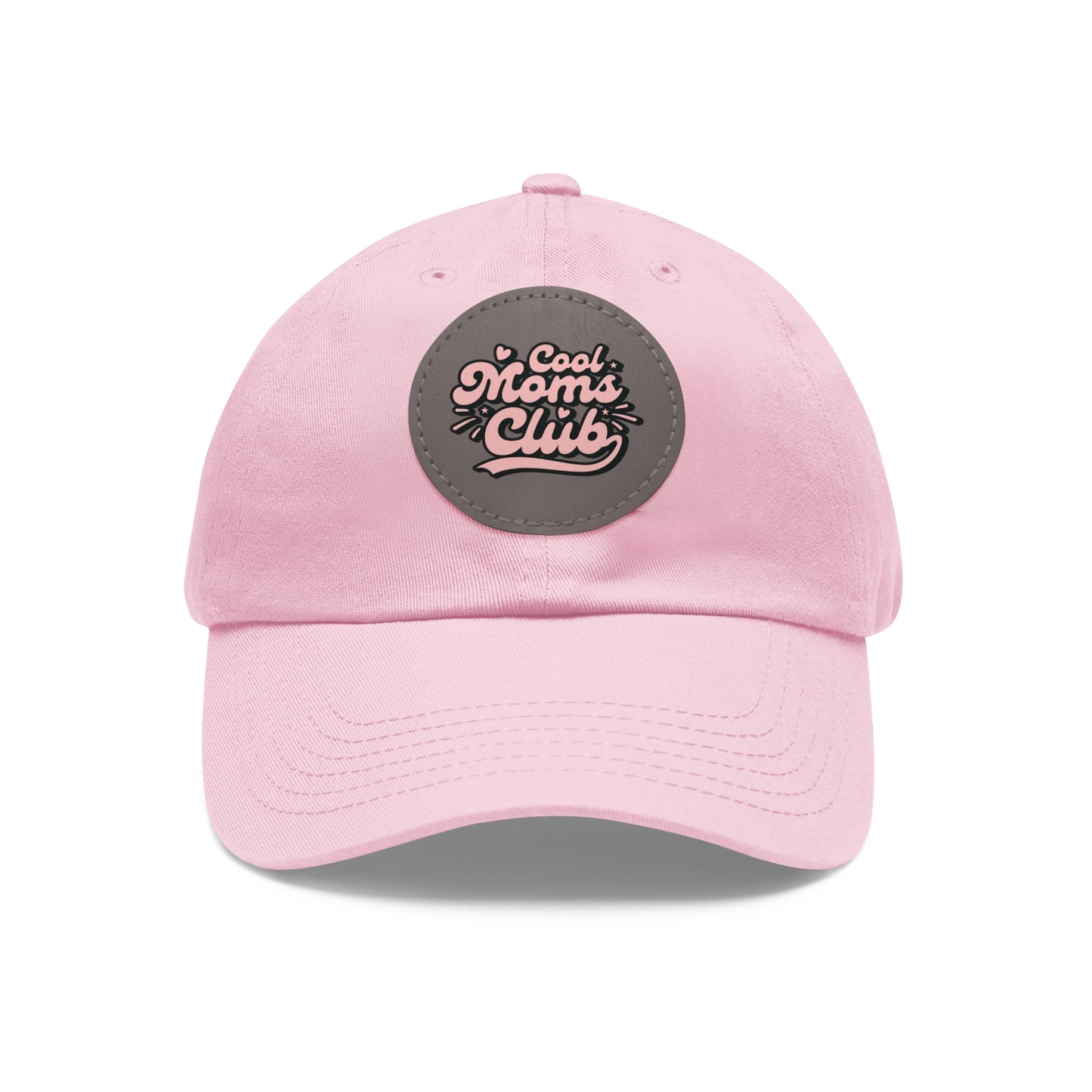 A light pink "Cool Moms Club" Mom Hat with a grey patch on the front.