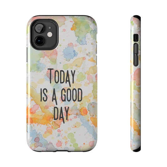 picture of an inspirational phone case that says "today is a good day" against a bright watercolor abstract painting