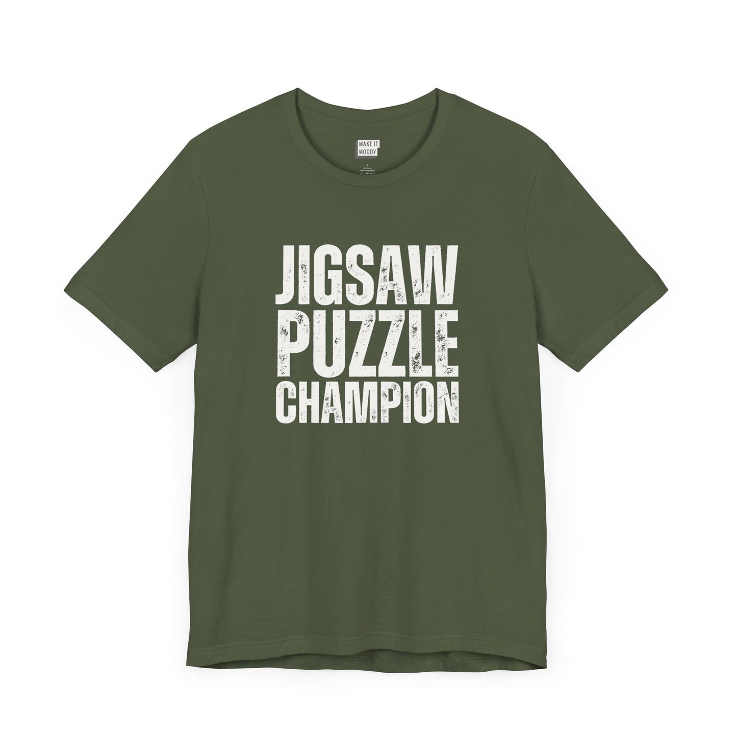 funny graphic t shirt in dark green that says JIGSAW PUZZLE CHAMPION in bold white lettering