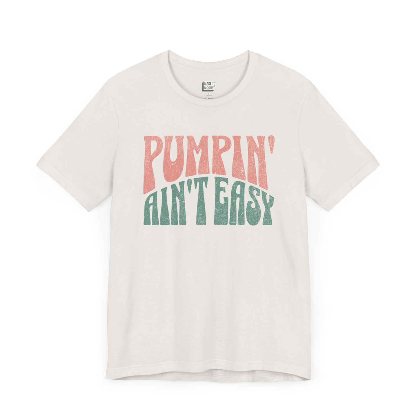 Vintage white breastfeeding t-shirt that says Pumpin' Ain't Easy in pink and green retro lettering.