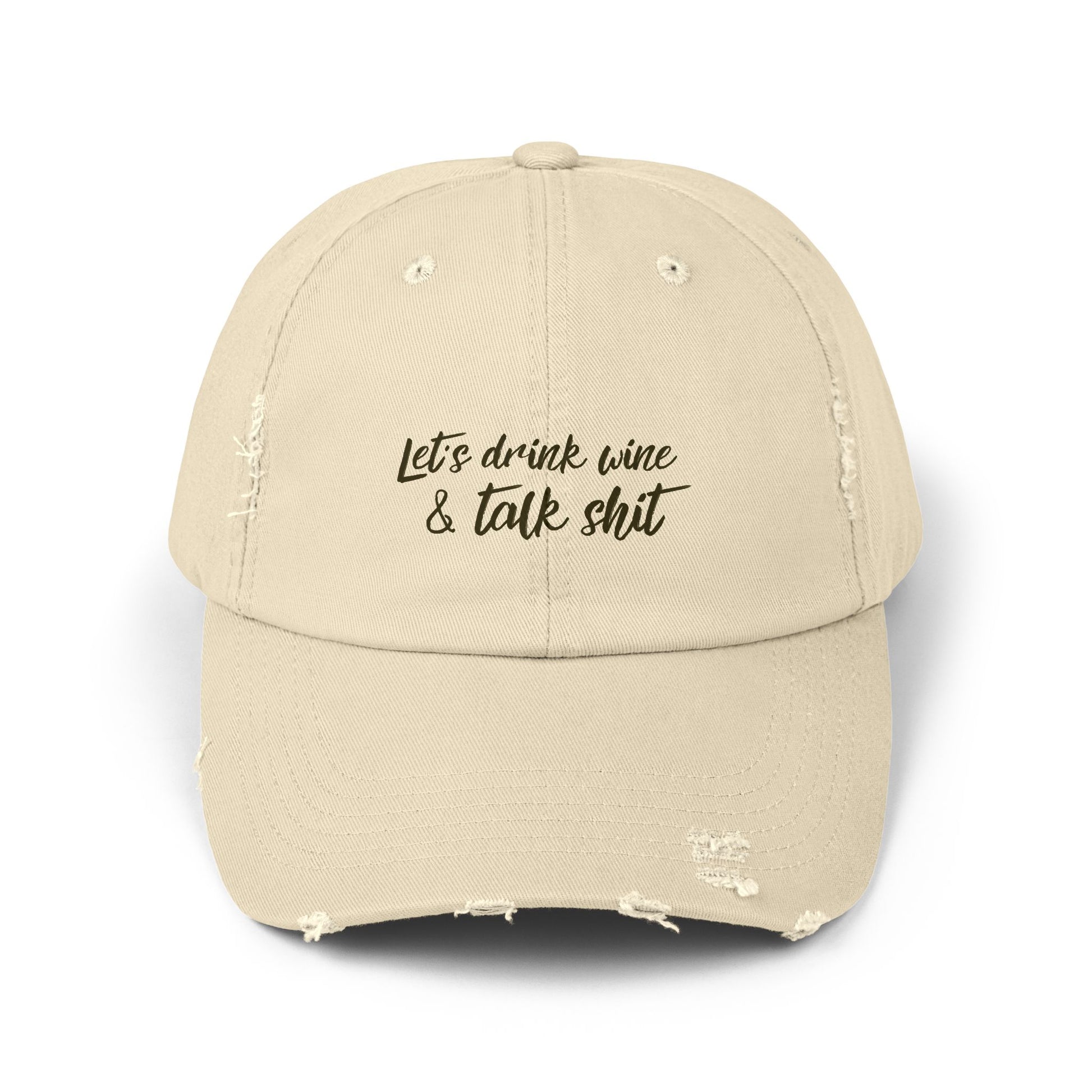 Stone colored drinking hat that says LET'S DRINK WINE & TALK SHIT on the front in black script lettering.