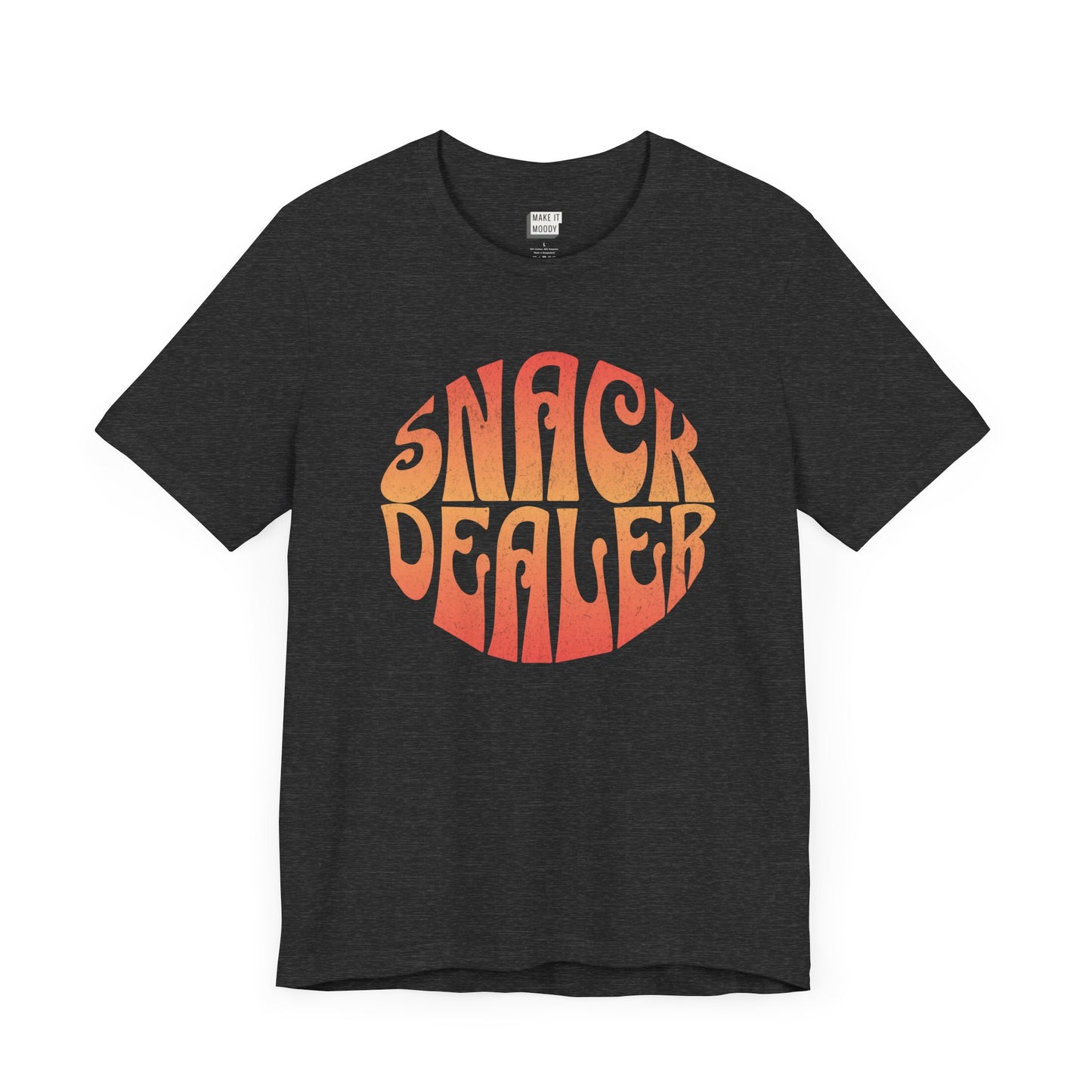 A dark grey mom t-shirt featuring a retro, orange gradient font with the words SNACK DEALER printed inside a circular design.