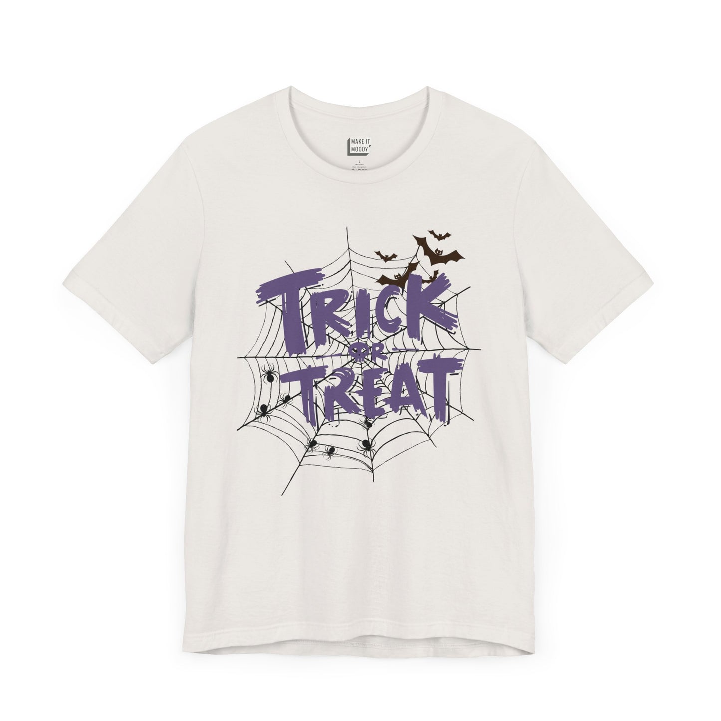 The "Trick or Treat" Halloween Tee is a white T-shirt featuring purple and black bats and a spider web in the design.