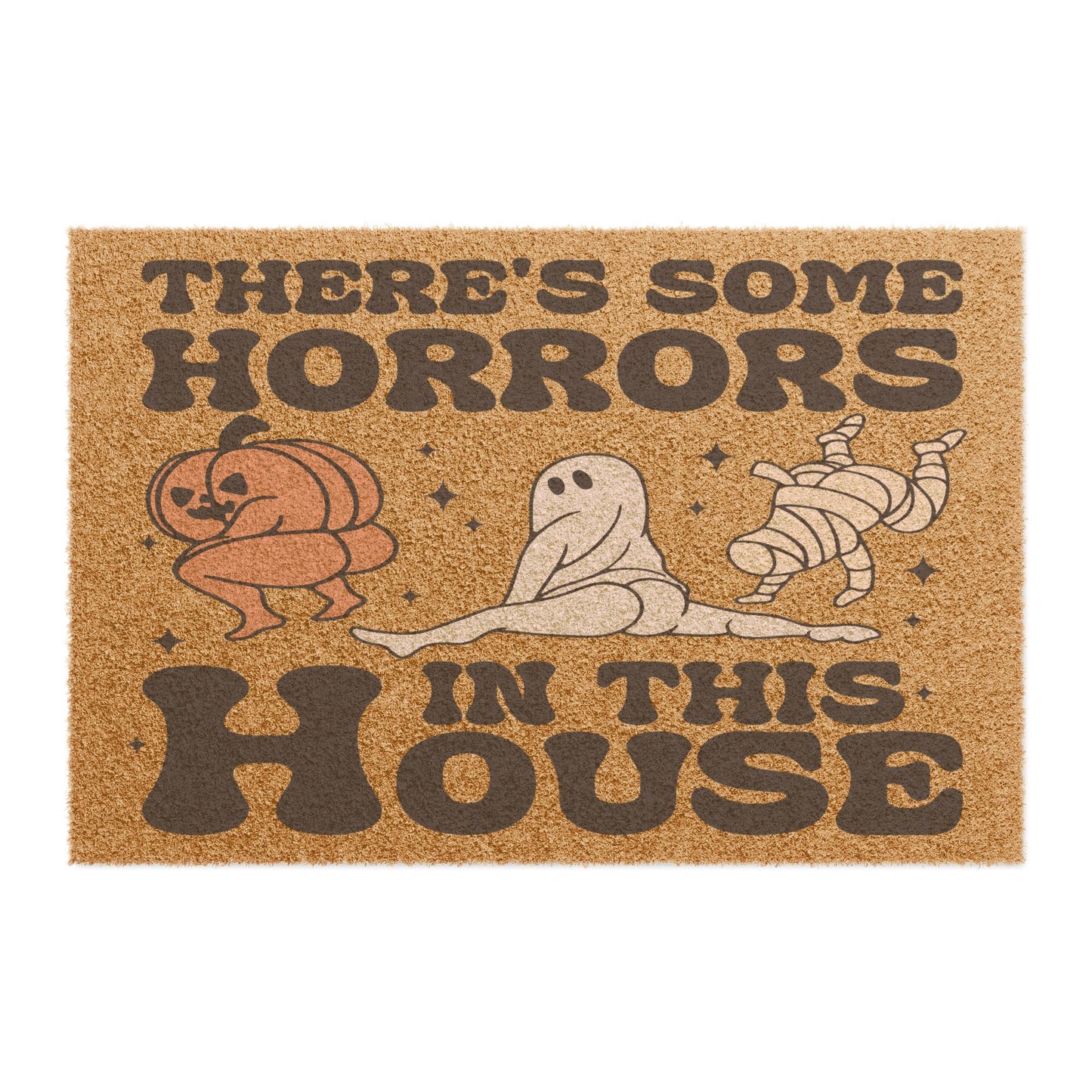 The "There's Some Horrors In This House" Halloween Doormat features text and illustrations of a pumpkin, ghost, and mummy.