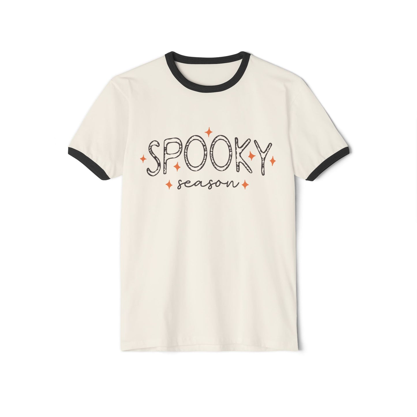 The "Spooky Season" Unisex Cotton Ringer Halloween T-Shirt in natural with black trim features playful black lettering and orange stars.