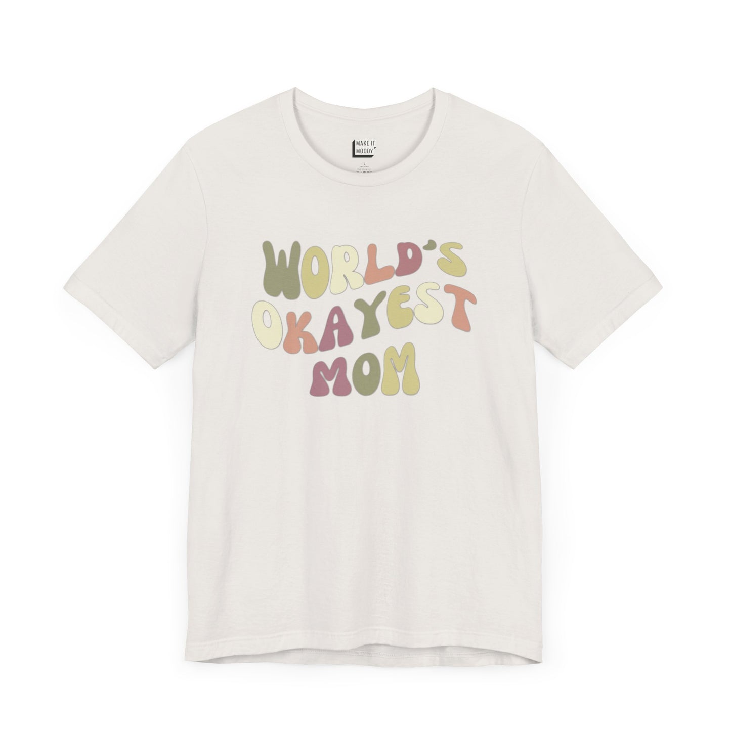 Vintage white mom t-shirt with colorful, playful text that reads WORLD'S OKAYEST MOM.