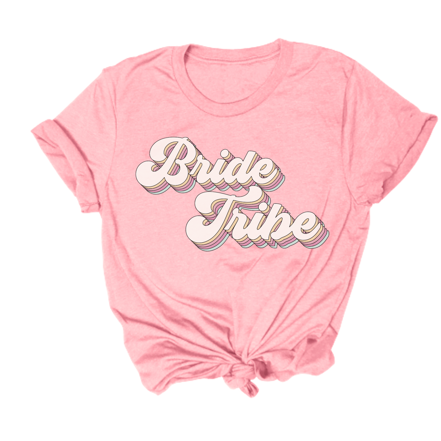 The Retro Bride Tribe Tee features a pink t-shirt design with rolled sleeves, showcasing "Bride Tribe" text in white with a rainbow outline on the front. It is stylishly knotted at the bottom.