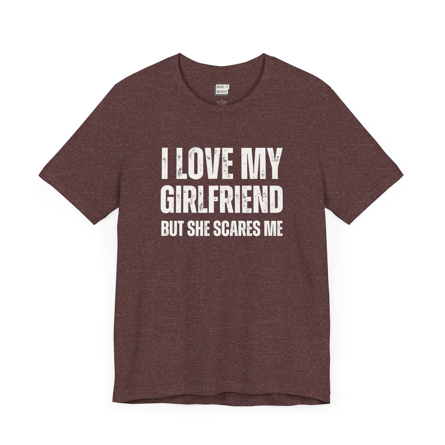 funny boyfriend shirt in maroon that says I LOVE MY GIRLFRIEND BUT SHE SCARES ME in bold white lettering