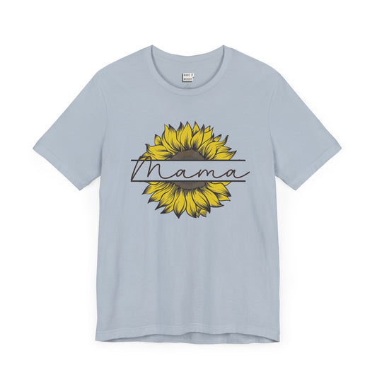 Mom t-shirt in light blue features a sunflower graphic with the word Mama across it in script font.