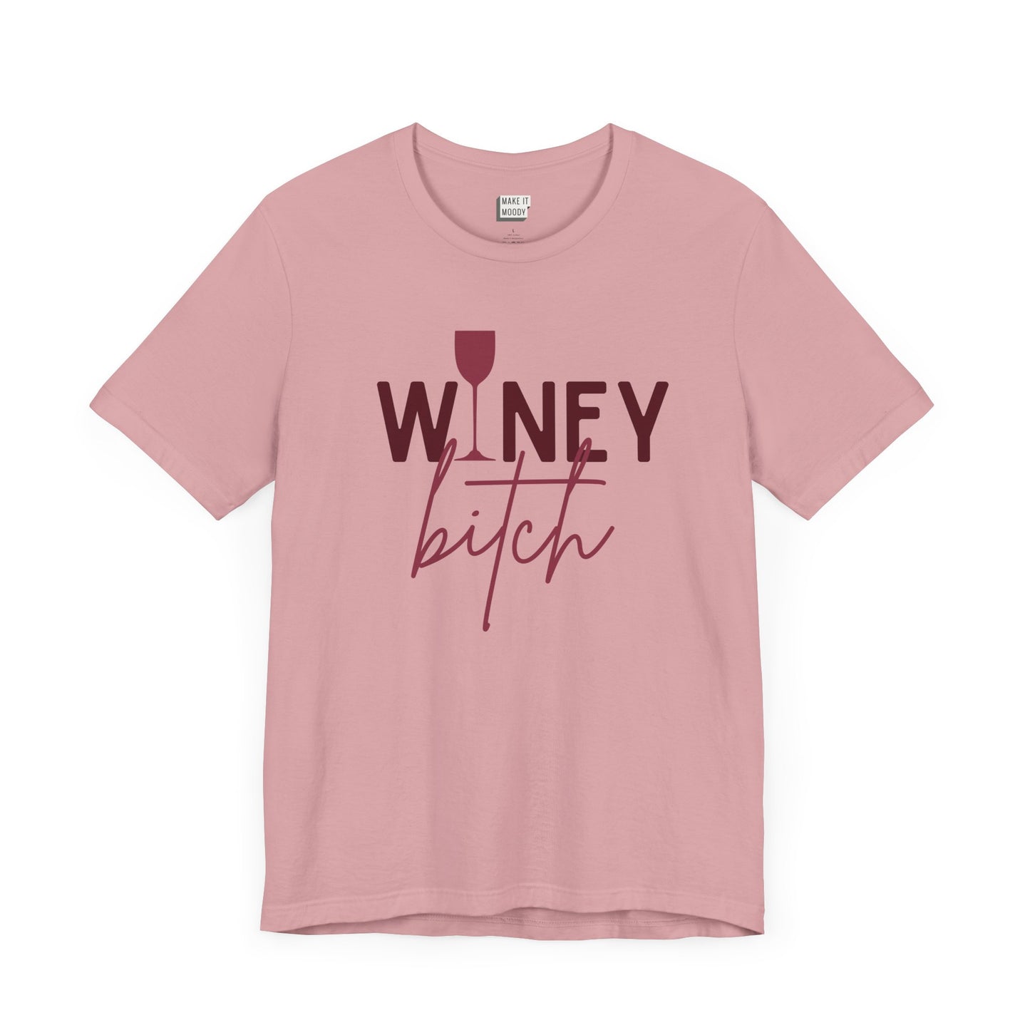 pink colored drinking t-shirt that says WINEY BITCH on the front. There is a graphic of a wine glass in place of the I in the word winey.