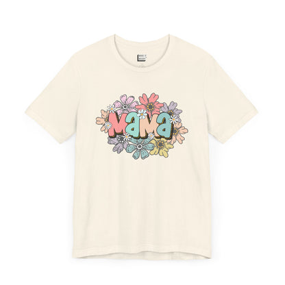 Off-white mom t-shirt adorned with the word Mama in colorful letters, surrounded by pastel flowers.