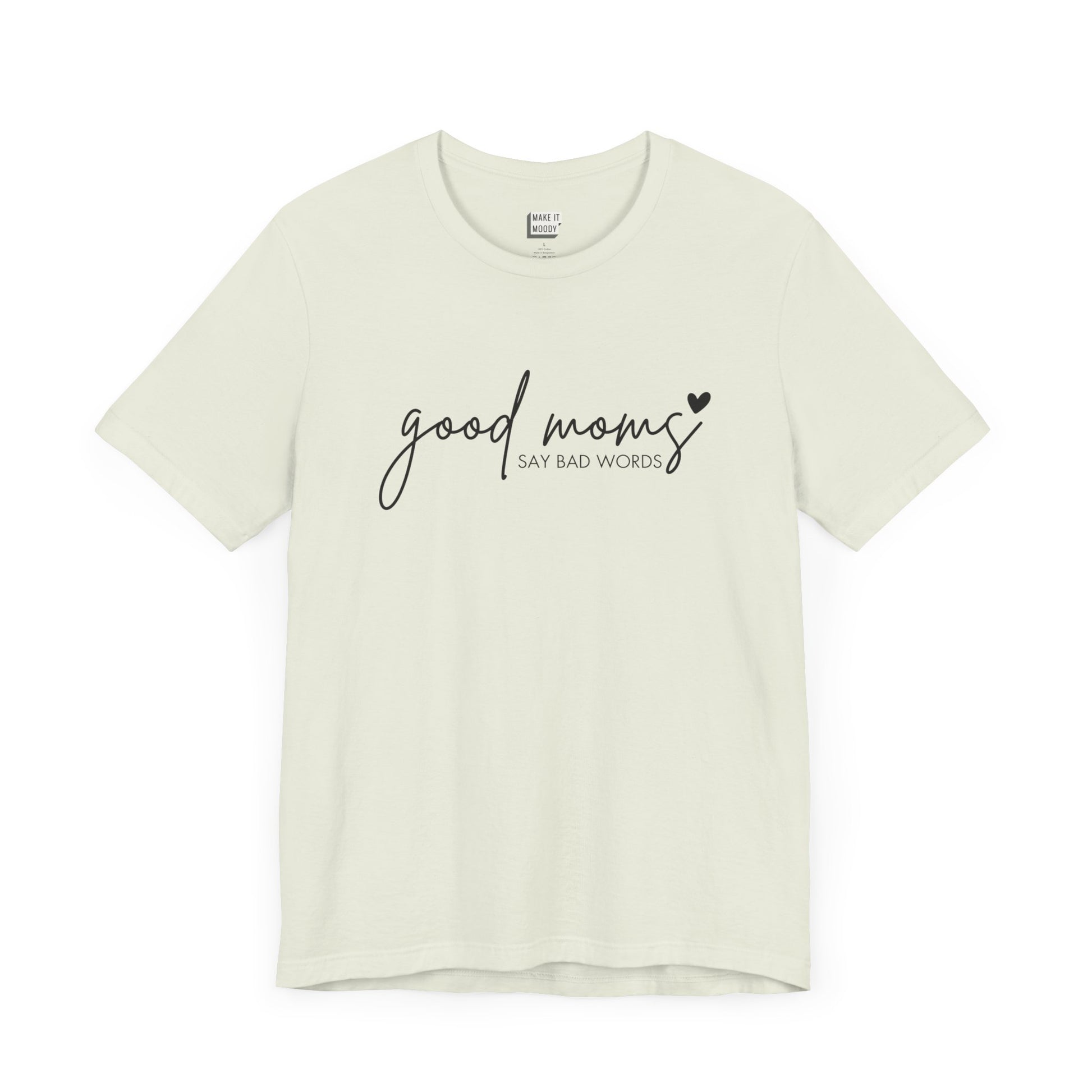 Mom Tee in light green, featuring black cursive and print text with the words good moms SAY BAD WORDS, accented by a small heart.