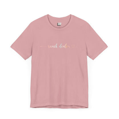 Orchid pink funny shirt for moms in grey with the words, "Snack Dealer" on the front in script font.