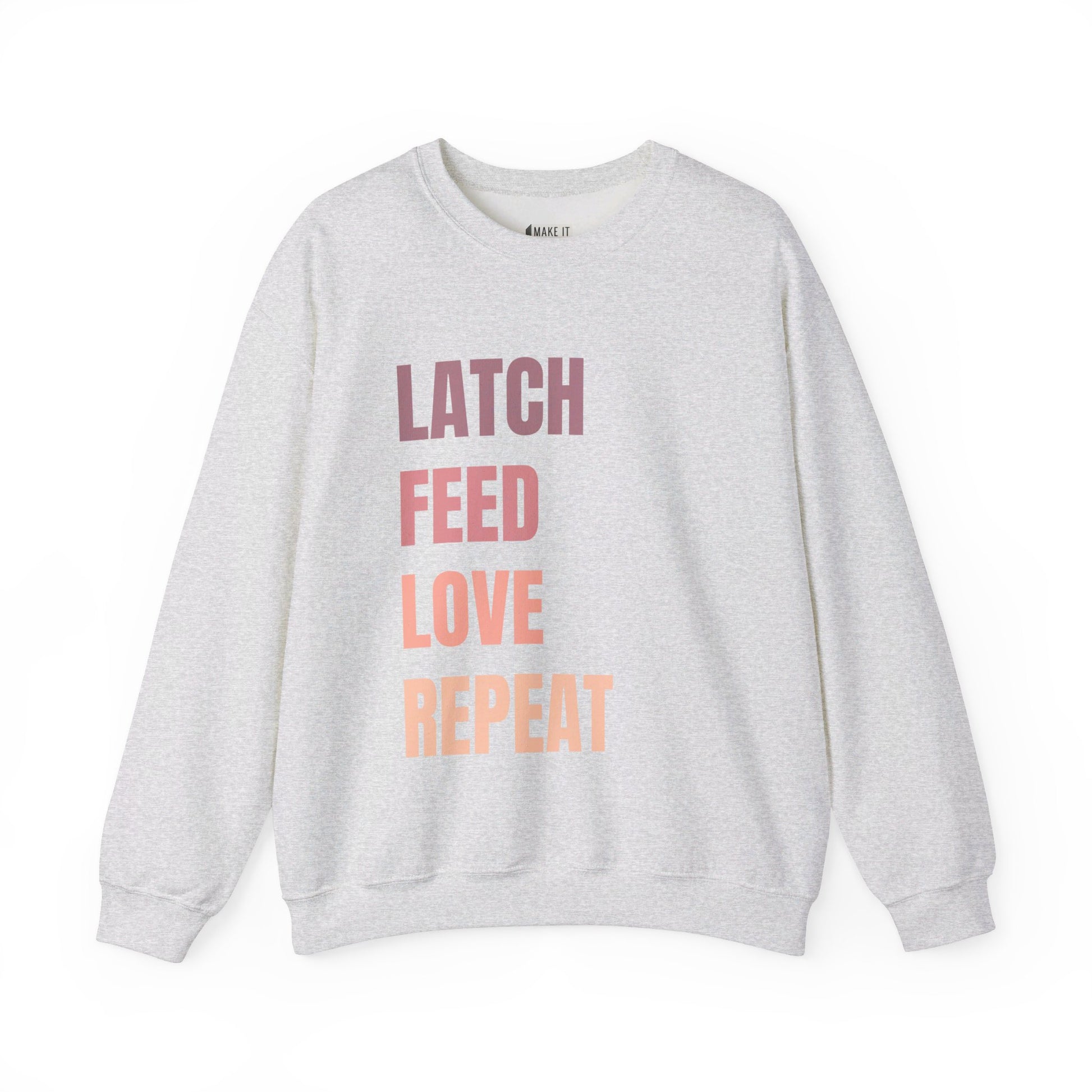 Ash colored breastfeeding sweatshirt that says LATCH FEED LOVE REPEAT in bold pink gradient font.