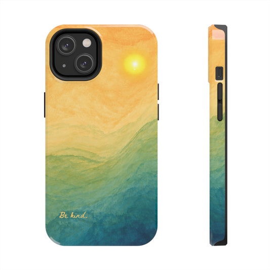 phone case featuring a serene view of the desert at sunset that says "be kind" at the bottom