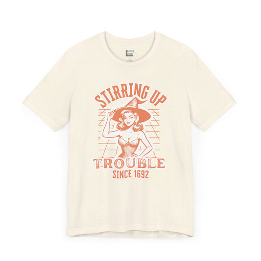 vintage style halloween witch t-shirt that says stirring up trouble since 1692
