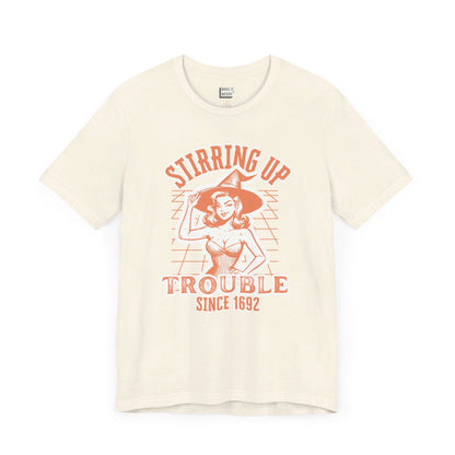 vintage style halloween witch t-shirt that says stirring up trouble since 1692 