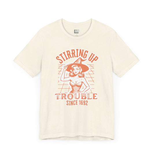 vintage style halloween witch t-shirt that says stirring up trouble since 1692 