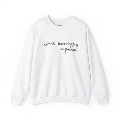 White breastfeeding sweatshirt that says NORMALIZE BREASTFEEDING IN PUBLIC on the front.