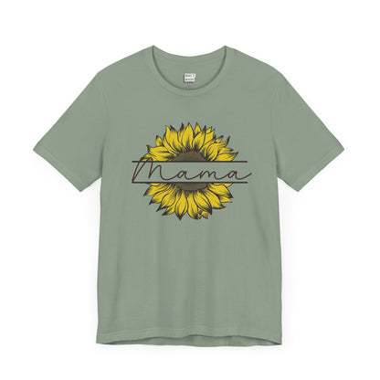 Mom t-shirt in sage green featuring a sunflower graphic with the word Mama across it in script font.