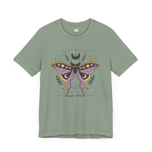 sage green t-shirt that says basic witch with a butterfly witch symbol design