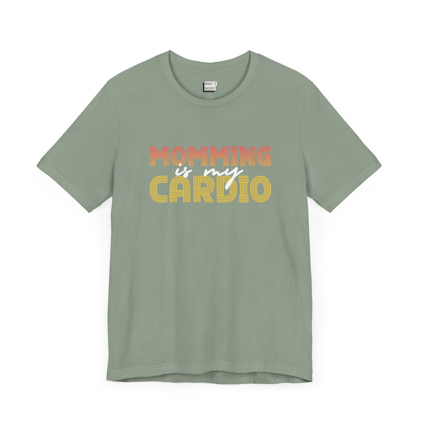 Sage green colored mom t-shirt featuring the text Momming is my Cardio in red, yellow, and white fonts.