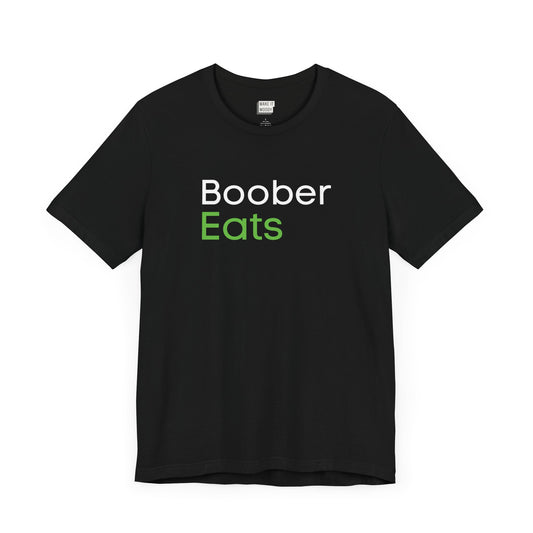 Black breastfeeding t-shirt with boober eats printed on the front in white and green lettering.