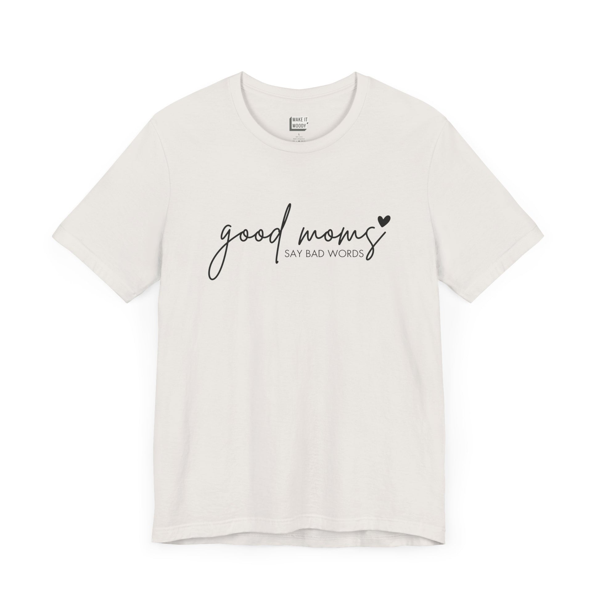 Mom Tee in vintage white, featuring black cursive and print text with the words good moms SAY BAD WORDS, accented by a small heart.