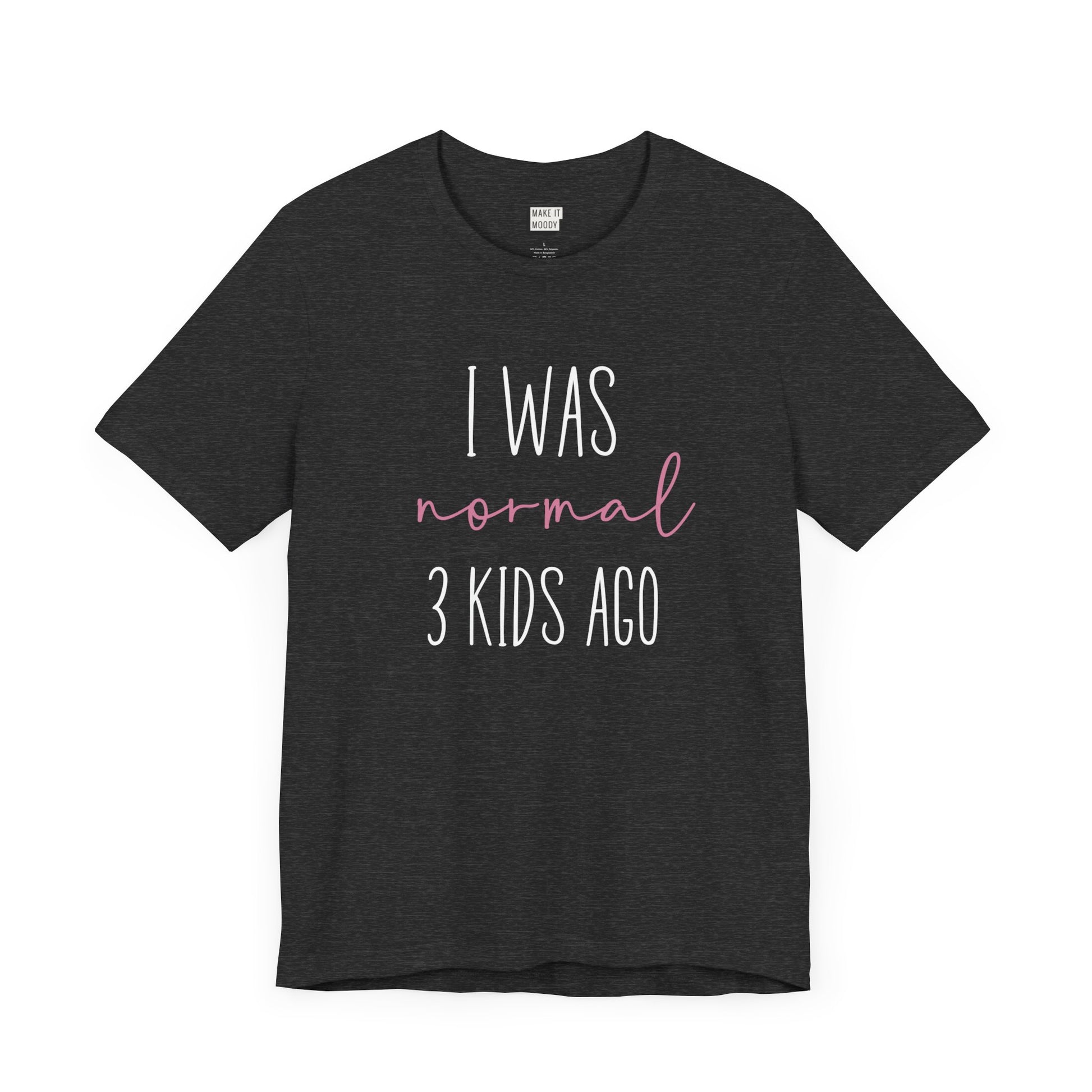 Dark heather grey Mom t-shirt with the text I Was Normal 3 Kids Ago printed in white and pink.