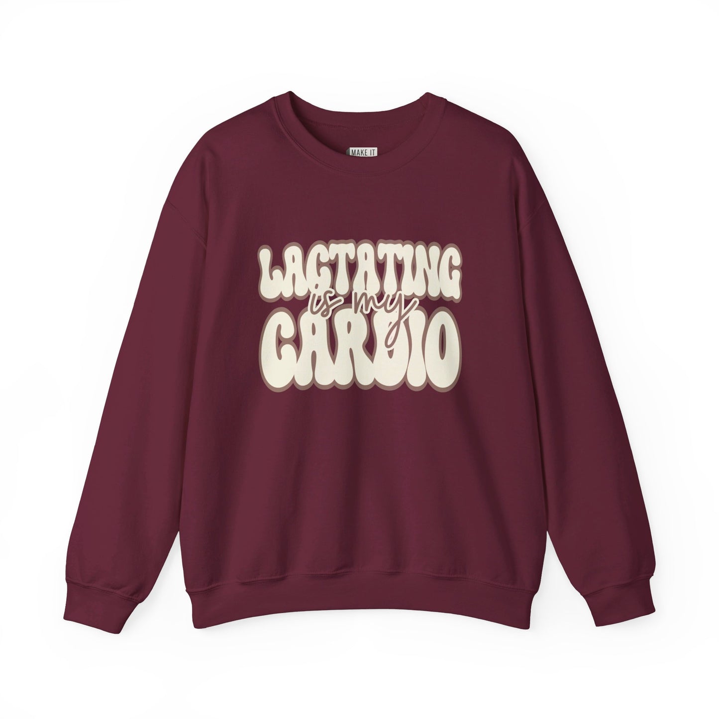 Maroon funny breastfeeding sweatshirt that says LACTATING IS MY CARDIO in retro lettering.