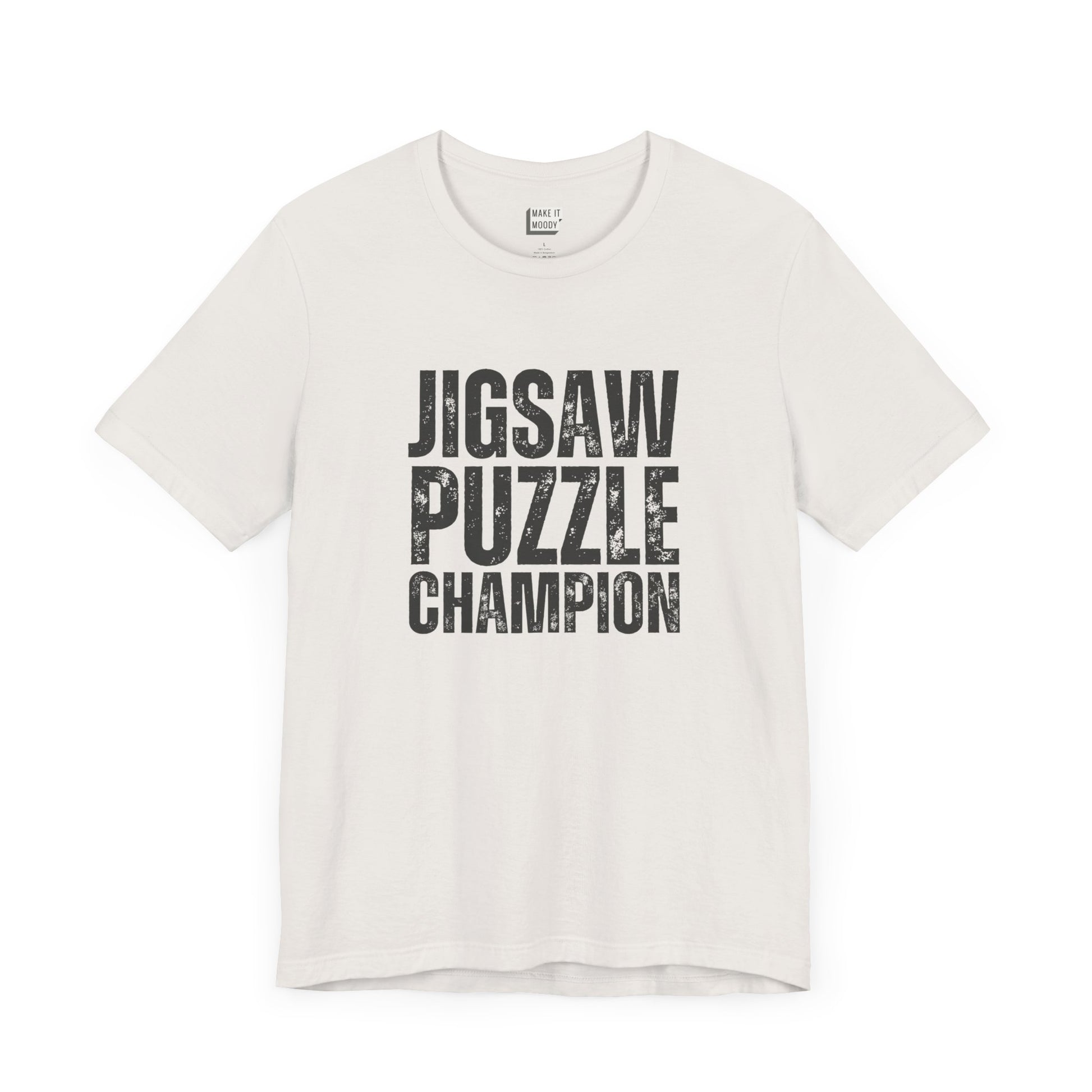 funny graphic t shirt in white that says JIGSAW PUZZLE CHAMPION in bold black lettering