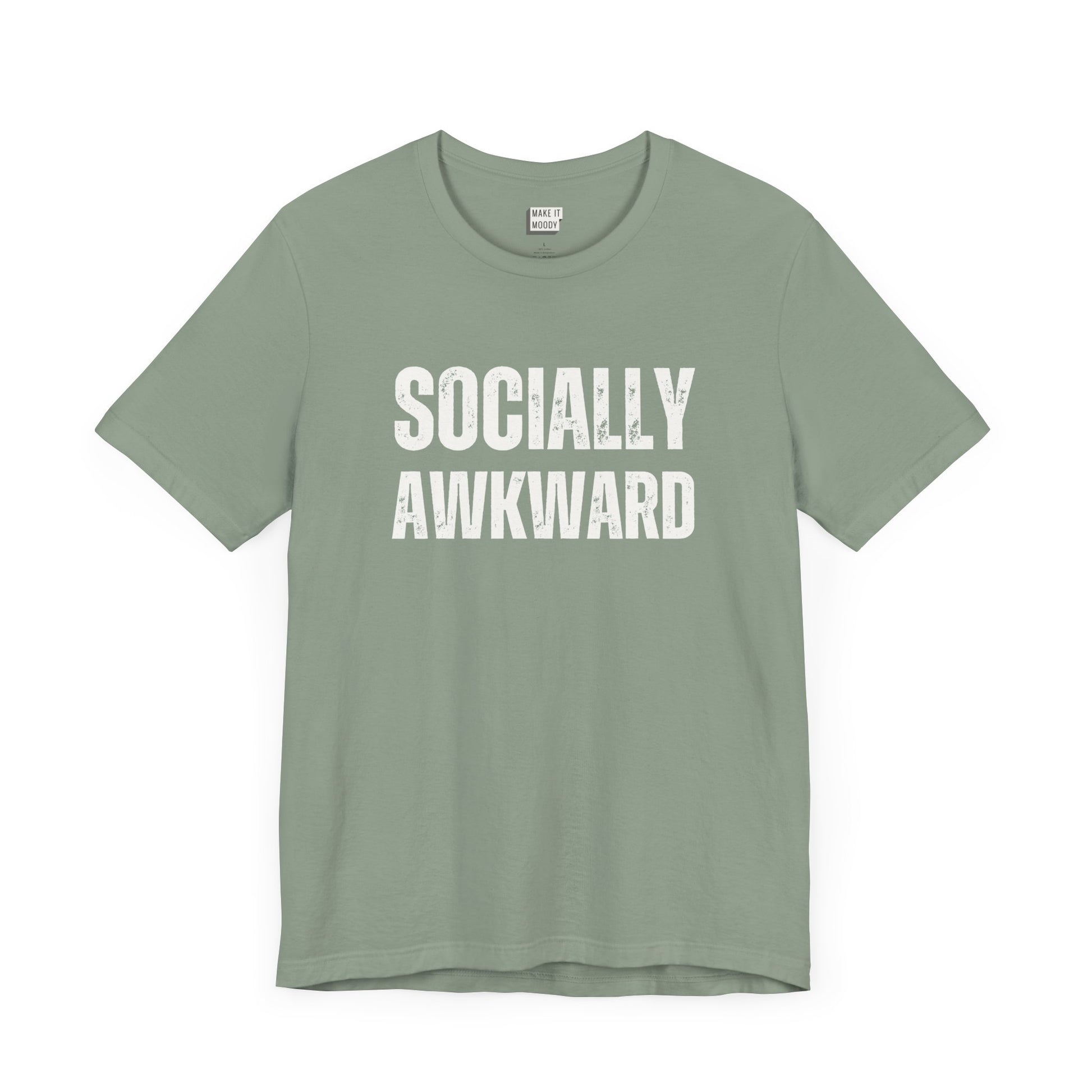 funny t shirt in the color sage green that says SOCIALLY AWKWARD in bold white lettering