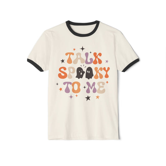 The "Talk Spooky To Me" Unisex Cotton Ringer Halloween T-Shirt in Natural/Black features "Talk Spooky to Me" text in colorful letters, adorned with ghost and star graphics.
