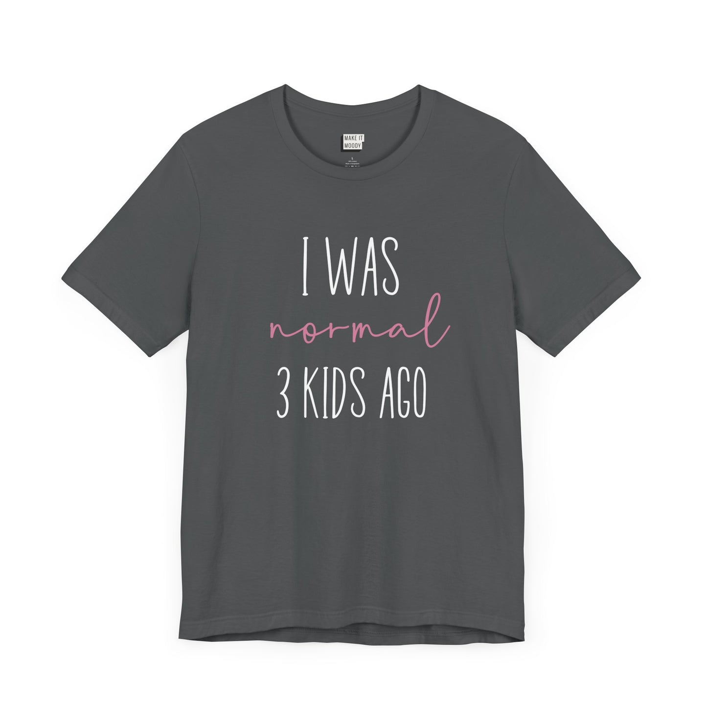 Charcoal Mom t-shirt with the text I Was Normal 3 Kids Ago printed in white and pink.