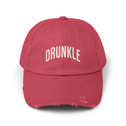 Red colored hat that says DRUNKLE on the front in arched lettering.