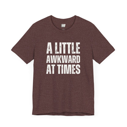 funny tshirt in maroon that says A LITTLE AWKWARD AT TIMES in bold white lettering