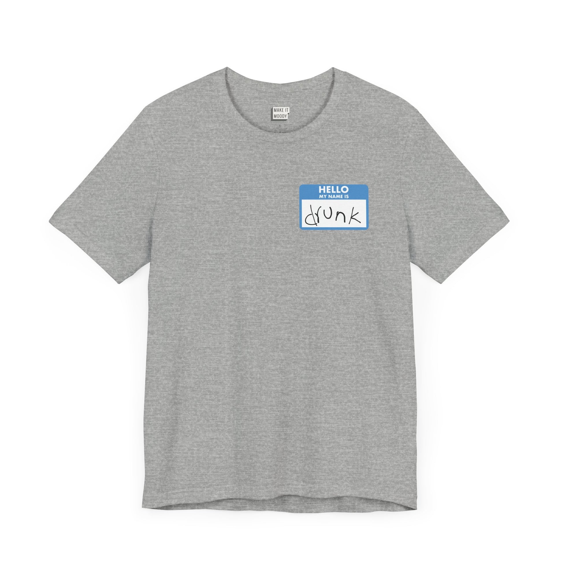 heather grey funny drinking t-shirt with a graphic the resemble and blue sticker name tag on the front in the top left corner. The name tag says HELLO MY NAME IS DRUNK, with the word drunk being handwritten in messy writing.