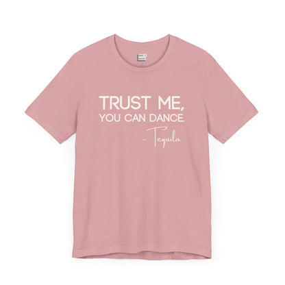 light pink drinking t-shirt that says TRUST ME YOU CAN DANCE - TEQUILA in bold white font