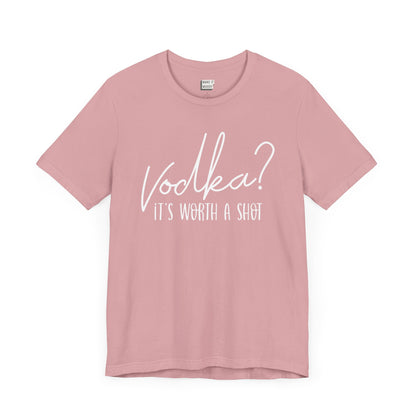 light pink drinking t-shirt that says VODKA? IT'S WORTH A SHOT in white lettering on the front