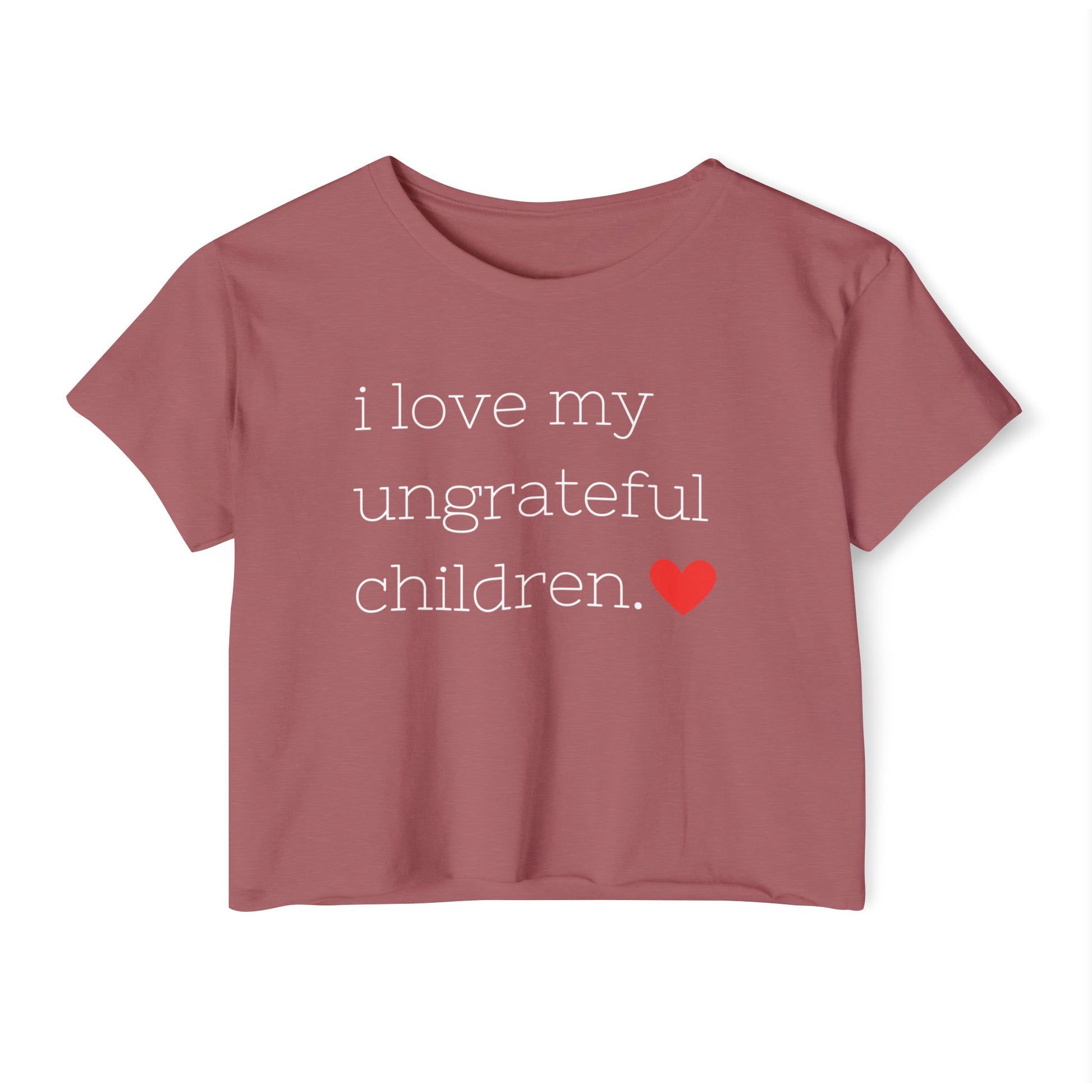 Mom crop top in smoked paprika featuring the words i love my ungrateful children in white lowercase courier font, with a small red heart icon at the end of the text.