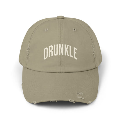 Light olive colored hat that says DRUNKLE on the front in arched lettering.