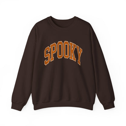 Brown colored Halloween crewneck sweatshirt featuring the word SPOOKY in arched, bold orange and black letters on the front.