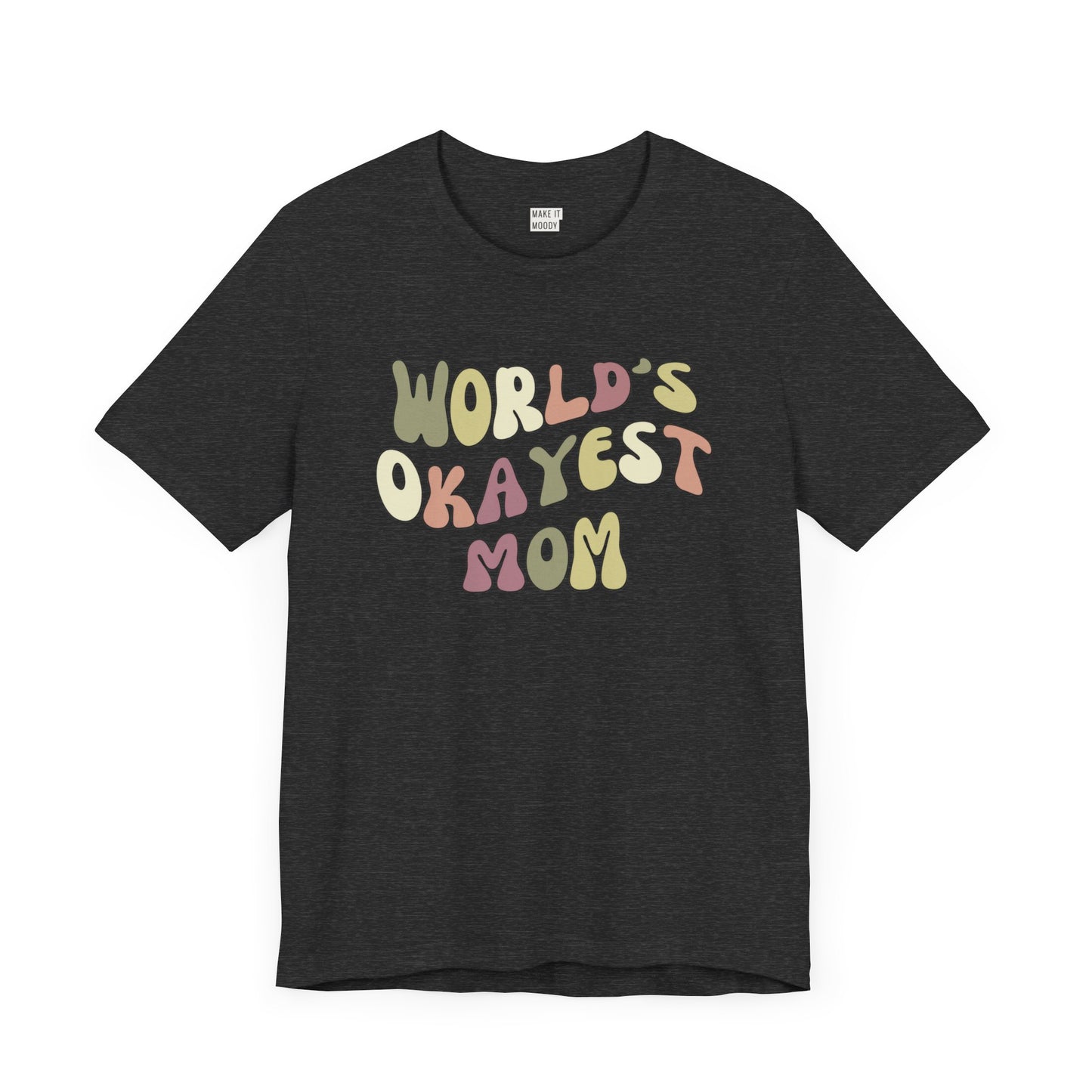 Dark heather grey mom t-shirt with colorful, playful text that reads WORLD'S OKAYEST MOM.