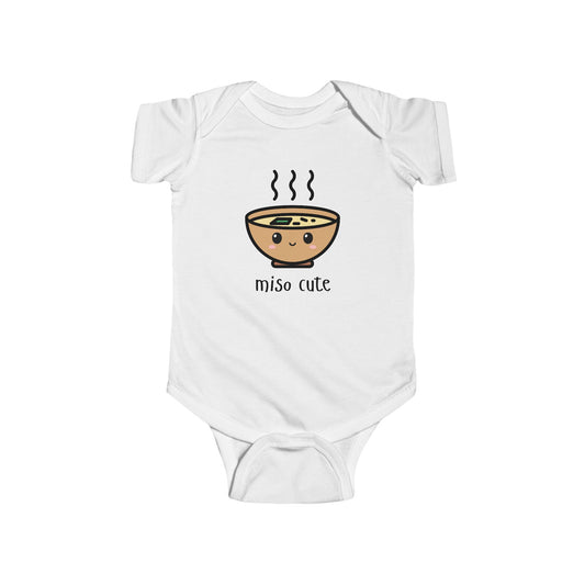 White infant bodysuit that says MISO CUTE with a kawaii illustration of a bowl of miso soup.