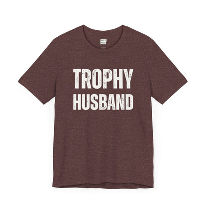 funny t shirt for men in maroon that says TROPHY HUSBAND in bold white lettering